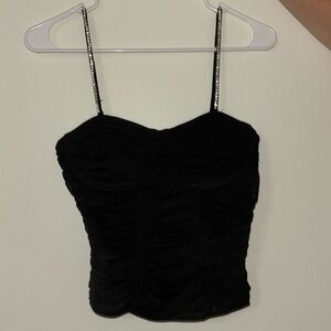 black fitted top with rhinestone spaghetti straps and wired corset